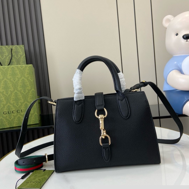 G*u*i top handle bags